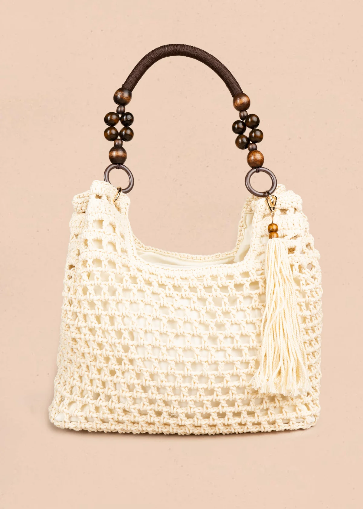Bolso tipo shopping color marfil tejido calado con borla decorativa 106845