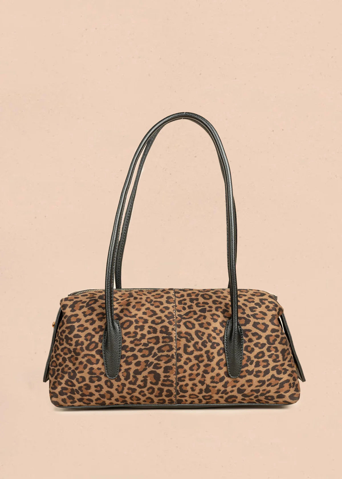 Bolso tipo cartera color animal print silueta tubular 106792